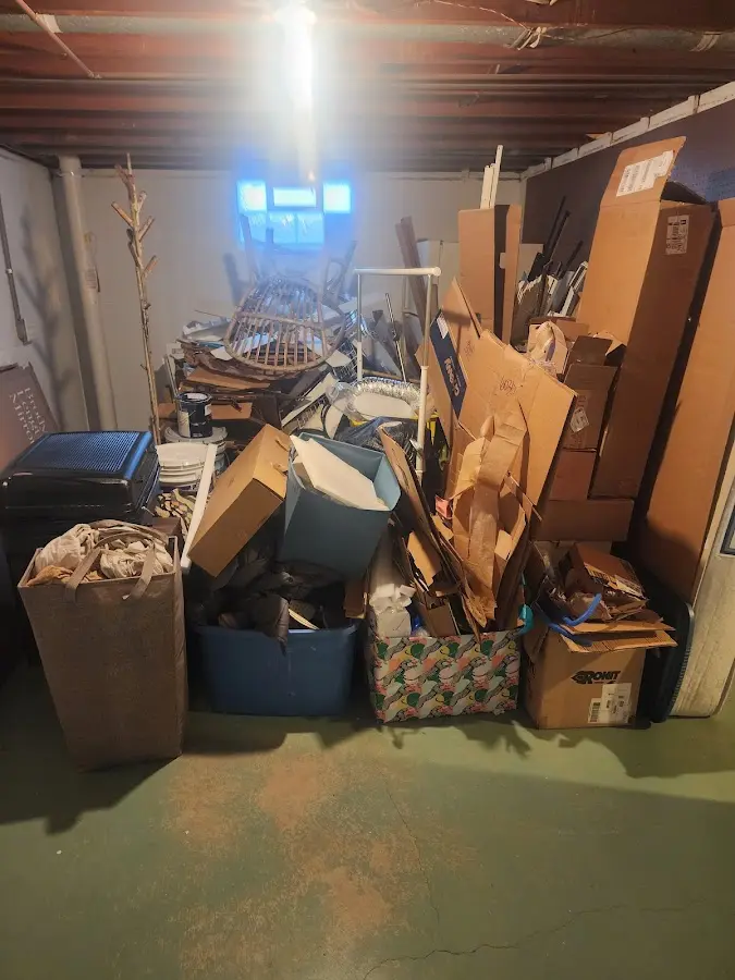 Roll-off dumpster container at job site for 2 Yard Dumpster Rental in Vidalia