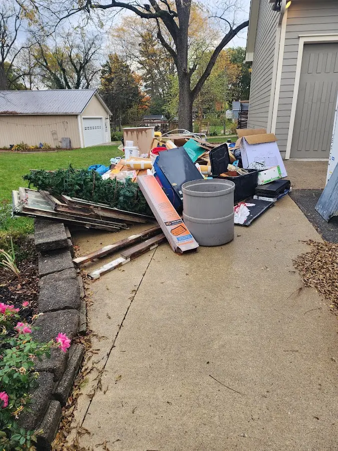 Dumpster being loaded with debris for Commercial Dumpster Rental in Vidalia